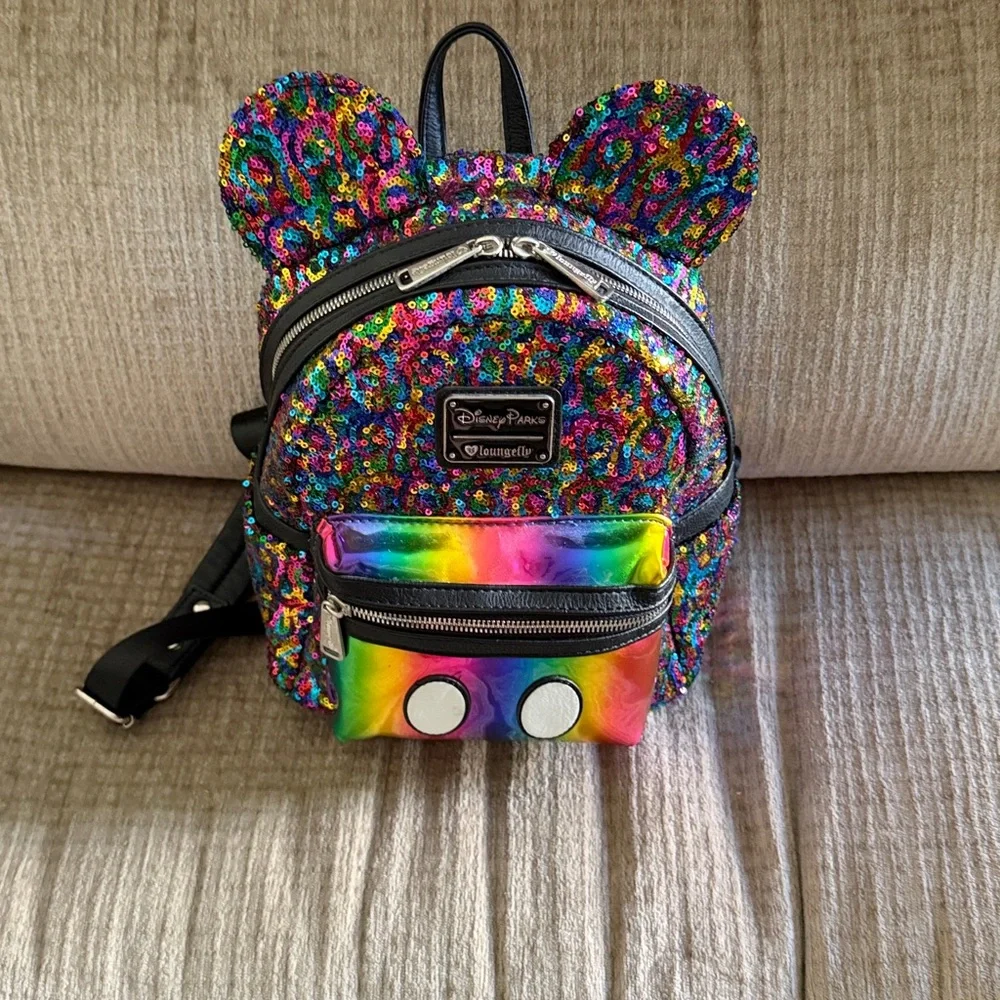 Disney lounge fly Multicolor Sequin retired backpack APX 11 x 8 gently used